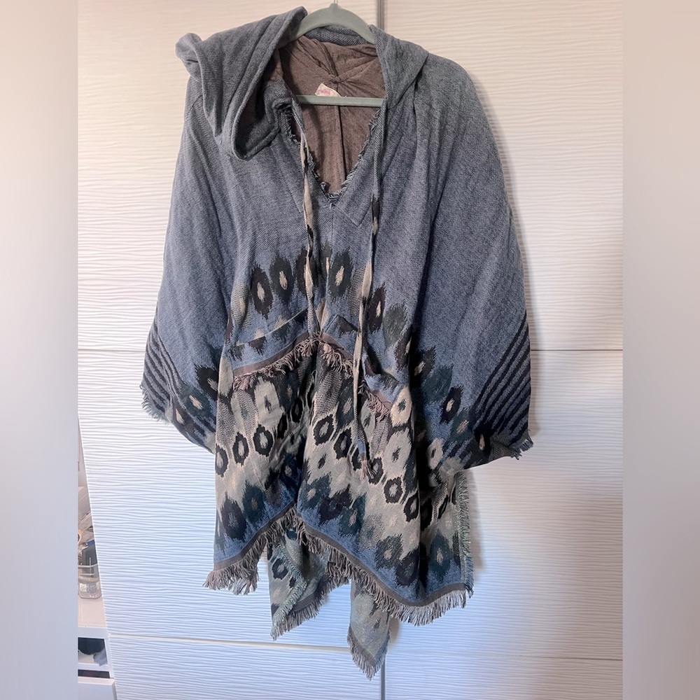 Blue free people poncho.✨
